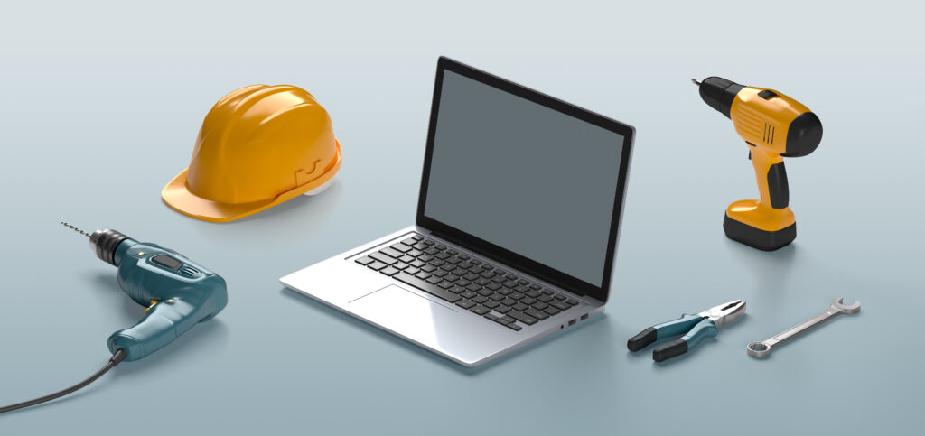 construction materials beside llaptop