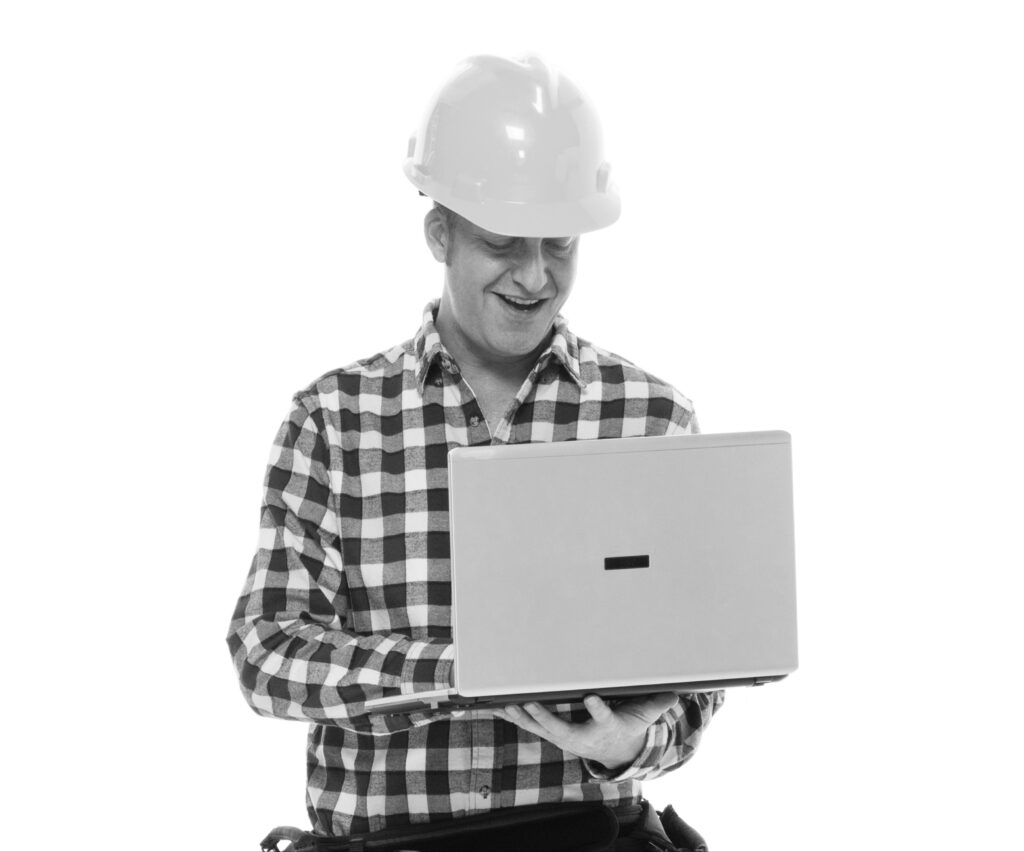 contractor checking updates on laptop